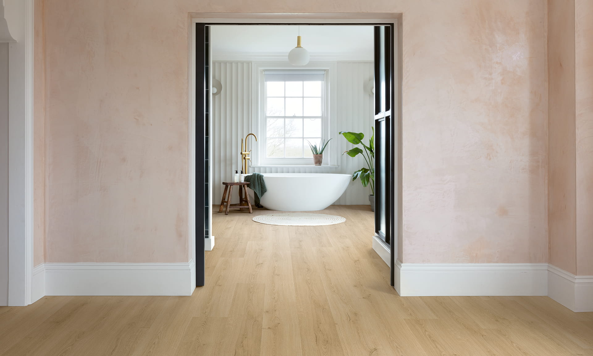 Bathroom with natural vinyl plank flooring